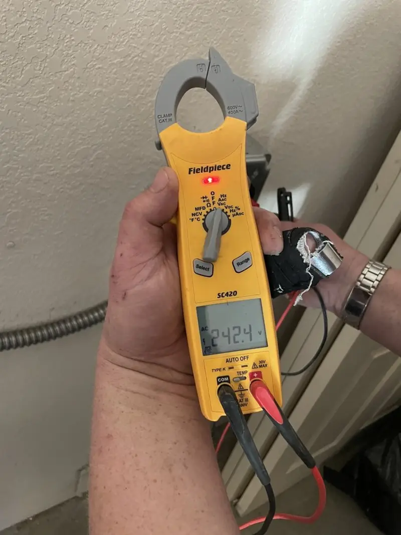 Voltage testing with clamp meter during Generator Installation in Polk City